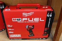 A boxed as new Milwaukee M12FIW38-622X Impact Wrench.