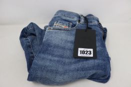 A pair of as new Diesel Sandy jeans (W27/L32 - RRP £145).