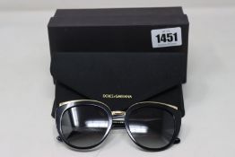 A pair of as new Dolce & Gabbana sunglasses.