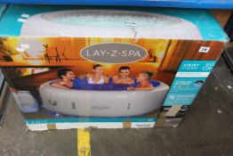 A boxed Bestway Lay-Z-Spa Paris Portable Spa (4/6 person).