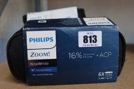 Two Philips Zoom DayWhite 6% Hydrogen Peroxide and two NiteWhite 16% Carbamide Peroxide (6 packs).