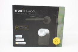 A Nuki Combo Smart Lock 2 + Bridge.