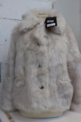 An as new The Kooples Natural Bear fake fur coat (Size 1 - RRP €425).