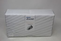 A boxed as new Philips Zoom! Chairside Light-Activated Whitening Kit (EXP: 12/2021).