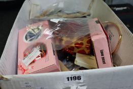 A quantity of assorted costume jewellery and related items.