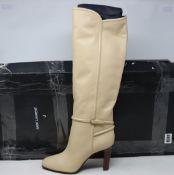 A pair of as new Saint Laurent Jane 90 mid heel knee boots (EU 38.5, damaged box).