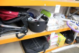 A miscellaneous assortment of children's items to include A Disney Frozen bicycle, a Cozy n Safe car