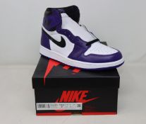 A pair of boxed as new Nike Jordan 1 Retro High Court Sneakers in purple and white (UK 8.5).