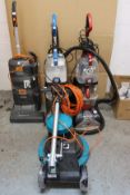 Four pre-owned floor cleaners - a Truvox Orbis eco Duo, a Vax Rapid Power and Rapid Power Plus and a