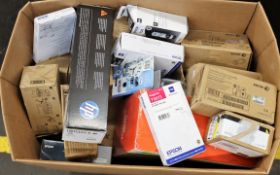 A box of assorted as new printer cartridges and related items (All items sold as seen).