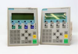 Two pre-owned Siemens Simatic OP7 Operator Panels (P/N: 6AV3607-1JC20-0AX1) (1 x back cover loose, 1