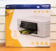 A boxed as new Brother MFC-J497DW multifunction printer in white (box damaged)