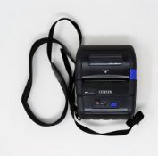 A pre-owned Citizen CMP-30BT Portable Bluetooth Label Printer with Citizen CMP-BA30 Battery Pack (