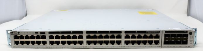 A pre-owned Cisco Catalyst 9300 - 48 port managed network switch (PN: C9300-48P) (Damage to