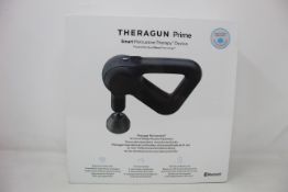 A boxed as new TheRagun Prime smart percussive therapy device.
