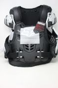 An as new Fox Raptor CE vest in black and white (Size: L/XL).