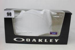 A pair of as new Oakley Fall Line XM Rubine Jasmine snow goggles (RRP £180).