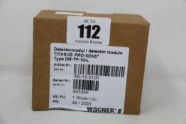 A boxed as new Wagner titanus pro-sens detector module (Type: DM-TP-10-L, Part no: AD-10-5100).