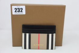 An as new Burberry Icon Stripe E-canvas and leather card case (RRP £140).