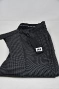 A pair of men's as new Porsche Design Houndstooth pants (EU 54) in box.