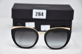 A pair of as new Dolce & Gabbana sunglasses.