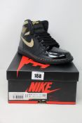 A pair of as new Nike Air Jordan 1 Hi OG (UK 6).