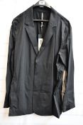 A men’s as new Arc’Teryx Veilance blazer in black (XL).
