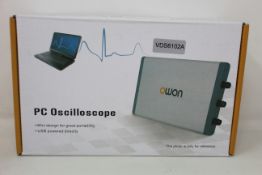 A boxed as new Owon VDS6102A PC Oscilloscope.
