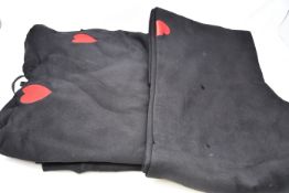 An as new Natasha Zinko Duo embroidered hooded sweatshirt (RRP $152) and a pair of embroidered