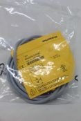 An as new Turck inductive proximity sensor (Ni4-DS20-2AP6X2, 165022).