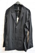 A men’s as new Arc’Teryx Veilance blazer in black (XL).