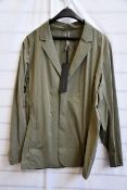 A men’s as new Arc’Teryx Veilance blazer in clay (XL).