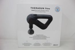 A boxed as new TheRagun Prime smart percussive therapy device.