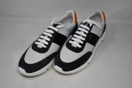 A pair of as new Axel Arigato sneakers (UK 10 - No box).