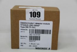A boxed as new Wagner titanus pro-sens detector module (Type: DM-TP-10-L, Part no: AD-10-5100).