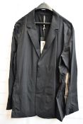 A men’s as new Arc’Teryx Veilance blazer in black (L).