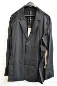 A men’s as new Arc’Teryx Veilance blazer in black (M).