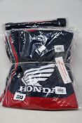 Six as new Fox 180 Honda motocross jerseys in black and red in a variety of sizes.