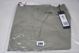 A pair of men’s as new Arc’Teryx Veilance Spere pants in moondust (32”).