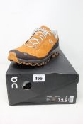 A pair of as new On Running Cloudventure (UK 12).