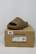 A pair of as new Adidas Yeezy Slide (UK 6).