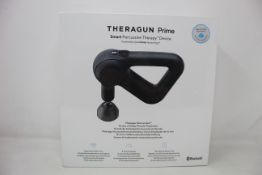 A boxed as new TheRagun Prime smart percussive therapy device.