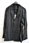 A men’s as new Arc’Teryx Veilance blazer in black (S).