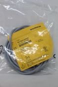 An as new Turck inductive proximity sensor (Ni4-DS20-2AP6X2, 165022).