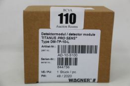 A boxed as new Wagner titanus pro-sens detector module (Type: DM-TP-10-L, Part no: AD-10-5100).