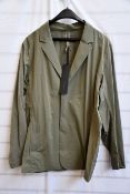 A men’s as new Arc’Teryx Veilance blazer in clay (S).