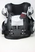 An as new Fox Raptor CE vest in black and white (Size: S/M).