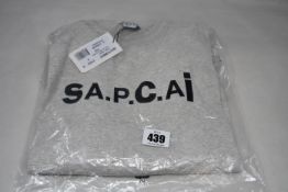 An as new A.P.C. x Sacai Kiyo Tee (S - RRP £185).