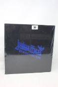 A Judas Preist 50 years of heavy metal blue edition hardback book (Not sealed).