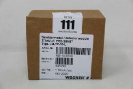A boxed as new Wagner titanus pro-sens detector module (Type: DM-TP-10-L, Part no: AD-10-5100).